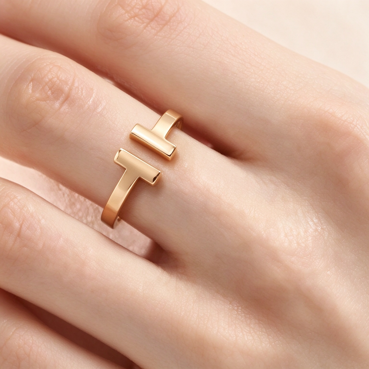 Tiffany T Collection Gold Single-Row Ring — A luxury unisex ring featuring the iconic T-shaped motif, blending classic and modern styles.
