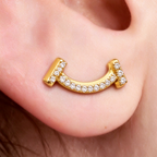 Tiffany T Smile earrings, yellow gold | Luxurious curved stud earrings, women's fine jewelry