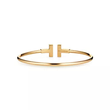Tiffany T Collection Yellow Gold Double T Bracelet—Iconic Double T motif and timeless American luxury.