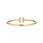 Tiffany T Collection Yellow Gold Double T Bracelet—Iconic Double T motif and timeless American luxury.