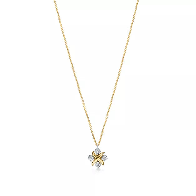 Tiffany & Co. Schlumberger Sixteen Stone X pendant necklace in yellow gold.