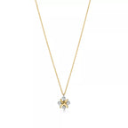 Tiffany & Co. Schlumberger Sixteen Stone X pendant necklace in yellow gold.