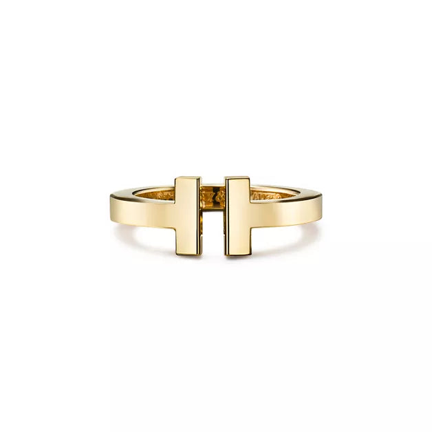 Tiffany T Collection Gold Single-Row Ring — A luxury unisex ring featuring the iconic T-shaped motif, blending classic and modern styles.