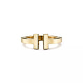 Tiffany T Collection Gold Single-Row Ring — A luxury unisex ring featuring the iconic T-shaped motif, blending classic and modern styles.