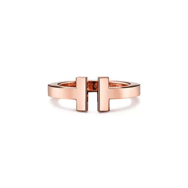 Tiffany T Collection Gold Single-Row Ring — A luxury unisex ring featuring the iconic T-shaped motif, blending classic and modern styles.
