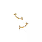 Tiffany T Smile earrings, yellow gold | Luxurious curved stud earrings, women's fine jewelry