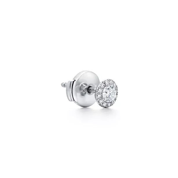 Tiffany Soleste Platinum Earrings—Iconic round brilliant-cut halo stud earrings | Luxury jewelry radiating a double dose of brilliance.