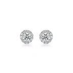 Tiffany Soleste Platinum Earrings—Iconic round brilliant-cut halo stud earrings | Luxury jewelry radiating a double dose of brilliance.