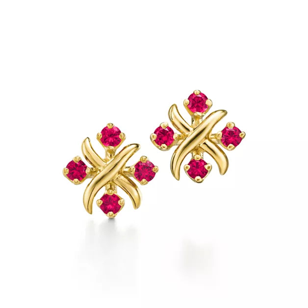 Tiffany Schlumberger gold stud earrings—iconic "X" motif crossover button-style studs.
