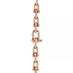 Tiffany gold wrap necklace—double-strand chain featuring signature spheres and a lock pendant.