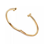 Tiffany T T1 Narrow Hinged Bangle in Yellow Gold—Modern Elegance and the Iconic Spirit of New York