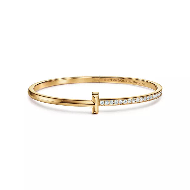 Tiffany T T1 Narrow Hinged Bangle in Yellow Gold—Modern Elegance and the Iconic Spirit of New York