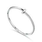 Tiffany T T1 Narrow Hinged Bangle in Platinum — Modern Elegance and the Iconic Spirit of New York