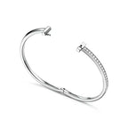 Tiffany T T1 Narrow Hinged Bangle in Platinum — Modern Elegance and the Iconic Spirit of New York