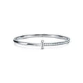 Tiffany T T1 Narrow Hinged Bangle in Yellow Gold—Modern Elegance and the Iconic Spirit of New York