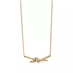 Tiffany Knot Small Gold Pendant Necklace — Signature Knot Chain