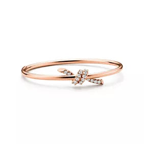 Tiffany T T1 Narrow Hinged Bangle in Yellow Gold—Modern Elegance and the Iconic Spirit of New York