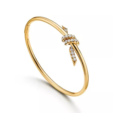 Tiffany T T1 Narrow Hinged Bangle in Yellow Gold—Modern Elegance and the Iconic Spirit of New York
