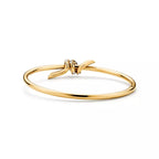 Tiffany T T1 Narrow Hinged Bangle in Yellow Gold—Modern Elegance and the Iconic Spirit of New York