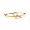 Tiffany T T1 Narrow Hinged Bangle in Yellow Gold—Modern Elegance and the Iconic Spirit of New York
