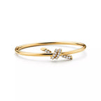Tiffany T T1 Narrow Hinged Bangle in Yellow Gold—Modern Elegance and the Iconic Spirit of New York