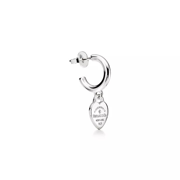 Tiffany "Return to Tiffany" Heart Tag Silver Hoop Earrings — silver drop earrings featuring the iconic engraved heart tag.