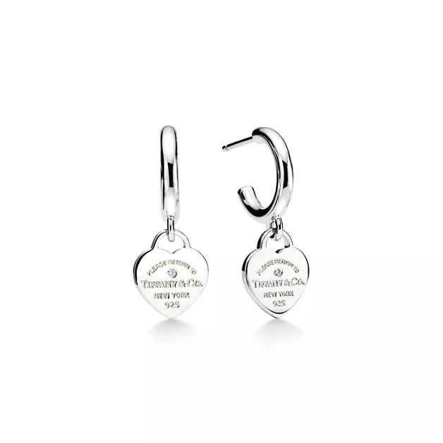 Tiffany "Return to Tiffany" Heart Tag Silver Hoop Earrings — silver drop earrings featuring the iconic engraved heart tag.