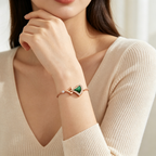 Bvlgari Divas' Dream rose gold bracelet with malachite, diamonds, and fan-shaped motifs.