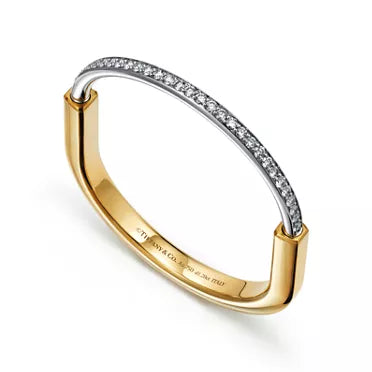 Tiffany Lock Narrow Gold Bangle—A Symbol of Enduring Protection and Timeless Elegance