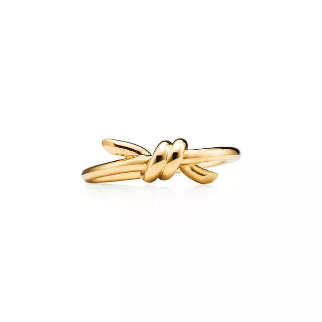 Tiffany Knot Ring — Yellow gold ring featuring the signature knot design; luxury jewelry for women.