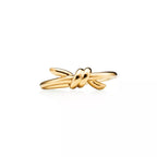 Tiffany Knot Ring — Yellow gold ring featuring the signature knot design; luxury jewelry for women.