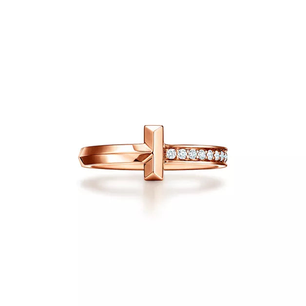 Tiffany T Diamond platinum band ring—featuring the iconic T motif.