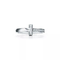 Tiffany T Diamond platinum band ring—featuring the iconic T motif.