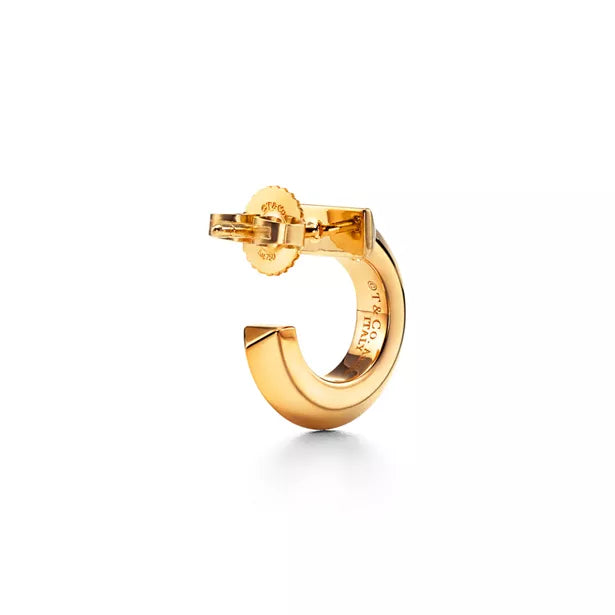 Tiffany T1 Gold Earrings — Iconic T-shaped hoop earrings | Luxury jewelry featuring a bold, minimalist geometric style