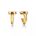 Tiffany T1 Gold Earrings — Iconic T-shaped hoop earrings | Luxury jewelry featuring a bold, minimalist geometric style