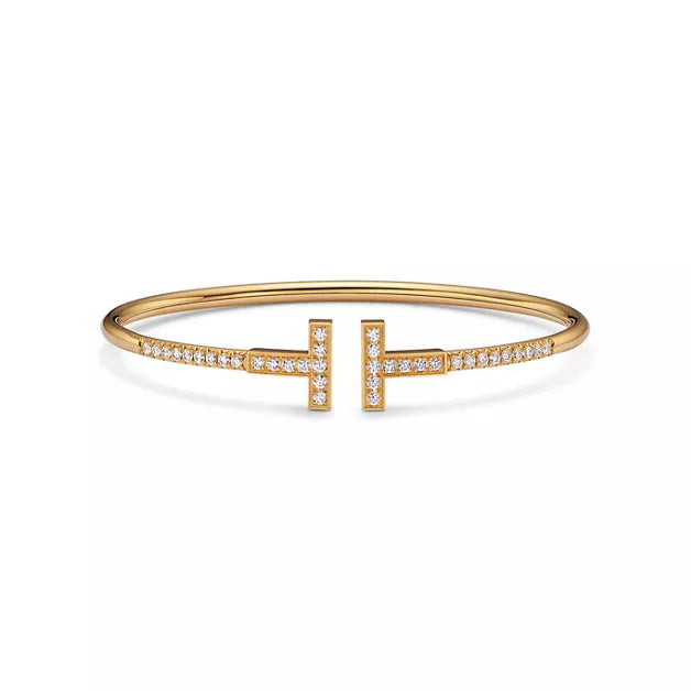 Tiffany T T1 Narrow Hinged Bangle in Yellow Gold—Modern Elegance and the Iconic Spirit of New York