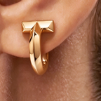 Tiffany T1 Gold Earrings — Iconic T-shaped hoop earrings | Luxury jewelry featuring a bold, minimalist geometric style