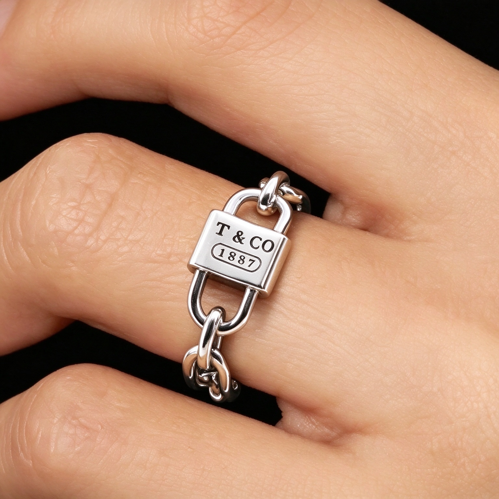 Tiffany 1837 Makers Narrow Chain Ring — Silver chain-style band featuring the signature T&CO hallmark plaque.