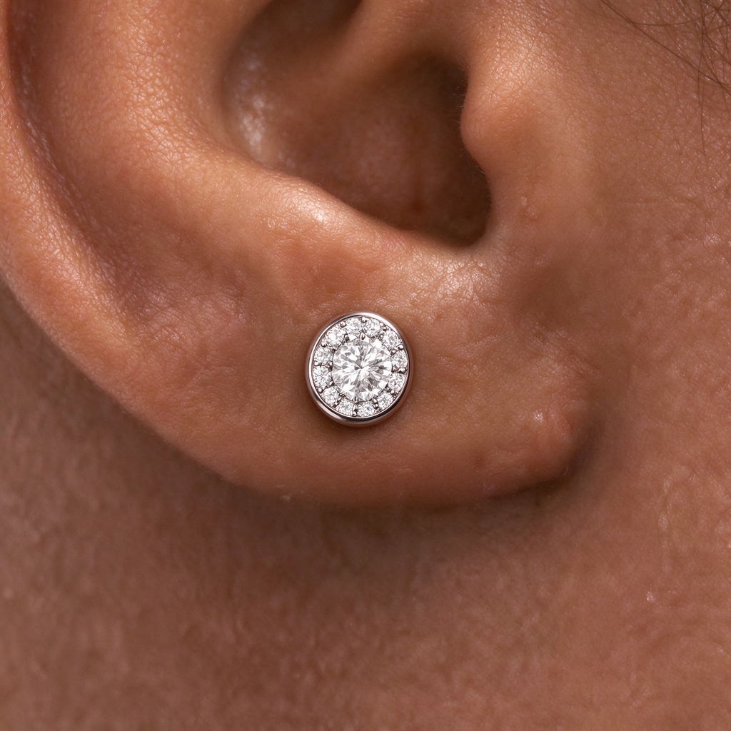 Tiffany Soleste Platinum Earrings—Iconic round brilliant-cut halo stud earrings | Luxury jewelry radiating a double dose of brilliance.