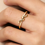 Tiffany Knot Ring — Yellow gold ring featuring the signature knot design; luxury jewelry for women.