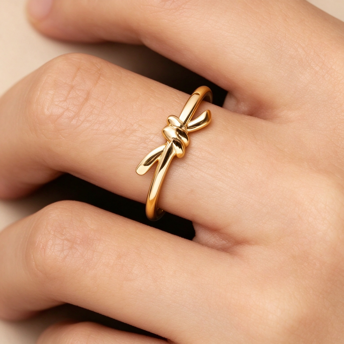 Tiffany Knot Ring — Yellow gold ring featuring the signature knot design; luxury jewelry for women.